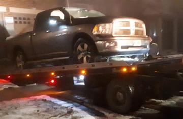 Flat Bed Tow Truck loading vehicle in pickering
