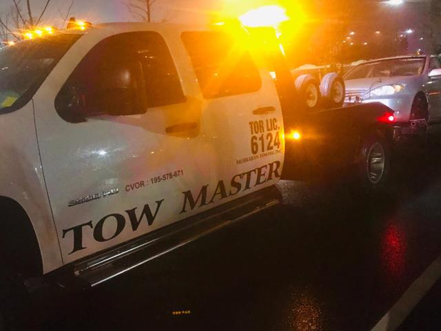 Tow Master Truck Parked in Office parking area pickering