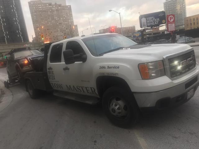 Tow Master Truck in action towards north york