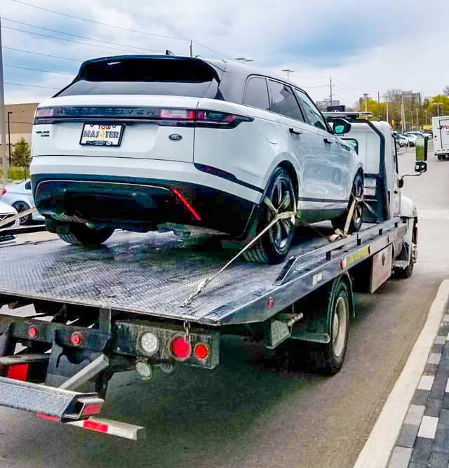 Luxury Vehicle Safe Towing by Tow Master in Downtown Toronto