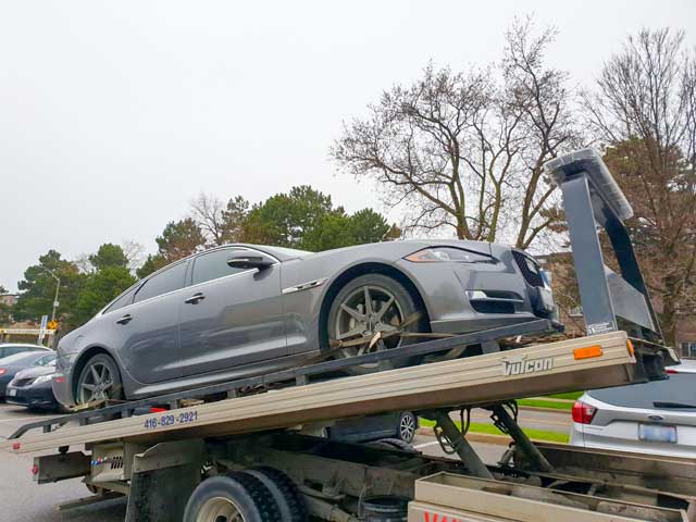 Luxury Vehicle Safe Towing by Tow Master in Pickering