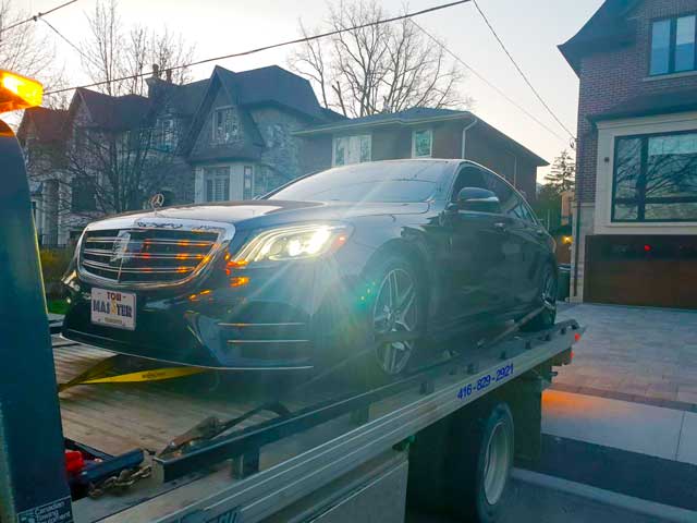 Luxury Vehicle Safe Towing by Tow Master in AJAX