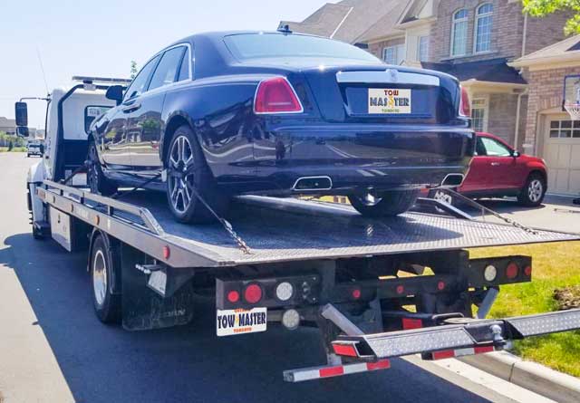 Luxury Vehicle Safe Towing by Tow Master from Scarborough