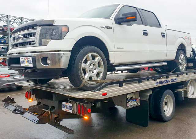 Luxury Vehicle Safe Towing by Tow Master from Downtown Toronto